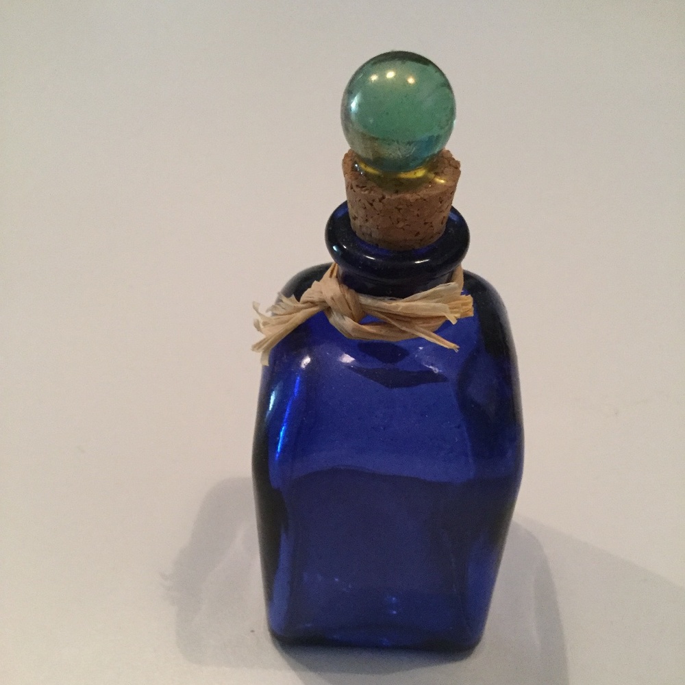 Glass bottle with pretty stopper